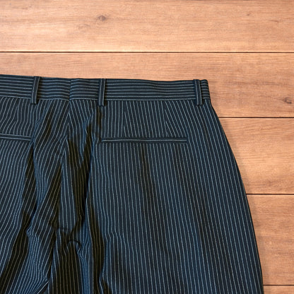 Vintage style baggy wide leg pinstripe tailored trousers in black.