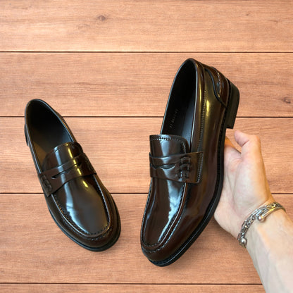 Lovely faux leather penny dress loafers shoes in brown.