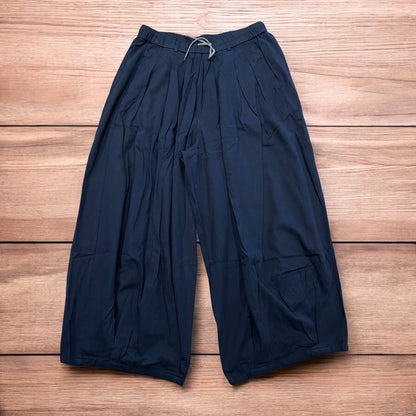 Incredible super baggy wide leg parachute trousers in dark blue wash.