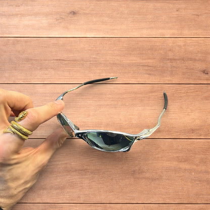 Insane metal frame sunglasses in silver with purple lense.
