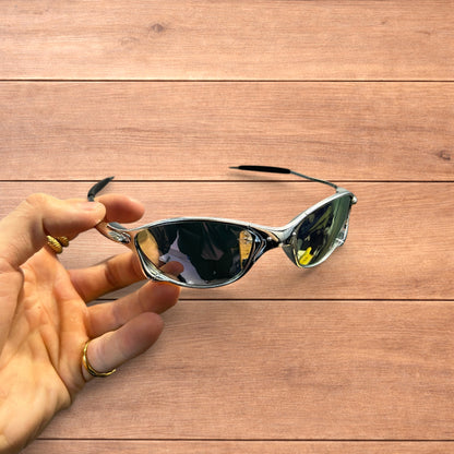 Insane metal frame sunglasses in silver with purple lense.