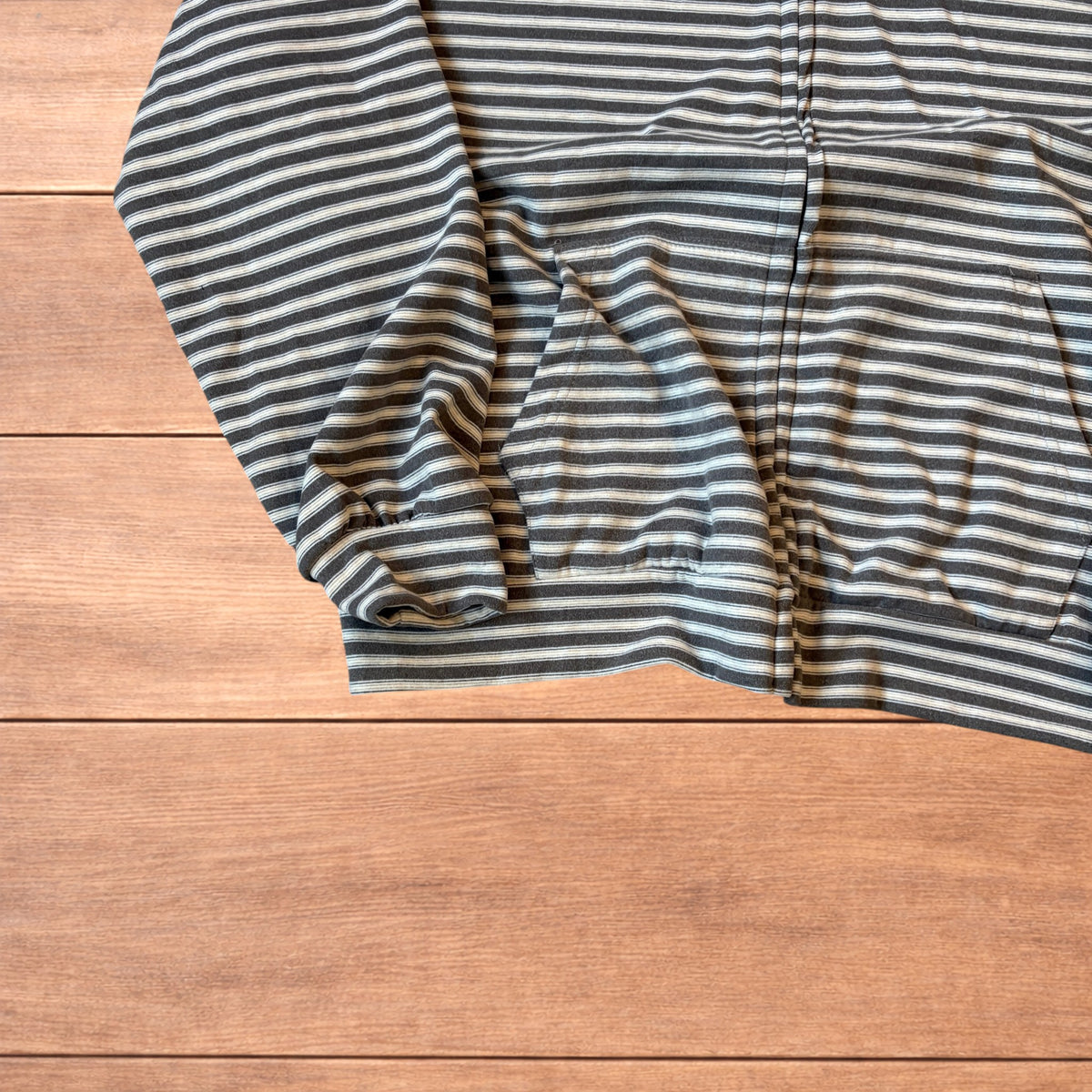 Baggy striped zip-up hoodie jumper in grey and white with hood, elasticated cuffs, front pockets and full zip closure.
