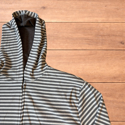 Baggy striped zip-up hoodie jumper in grey and white with hood, elasticated cuffs, front pockets and full zip closure.