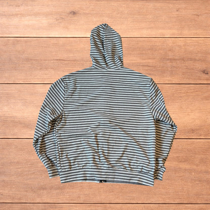 Baggy striped zip-up hoodie jumper in grey and white with hood, elasticated cuffs, front pockets and full zip closure.