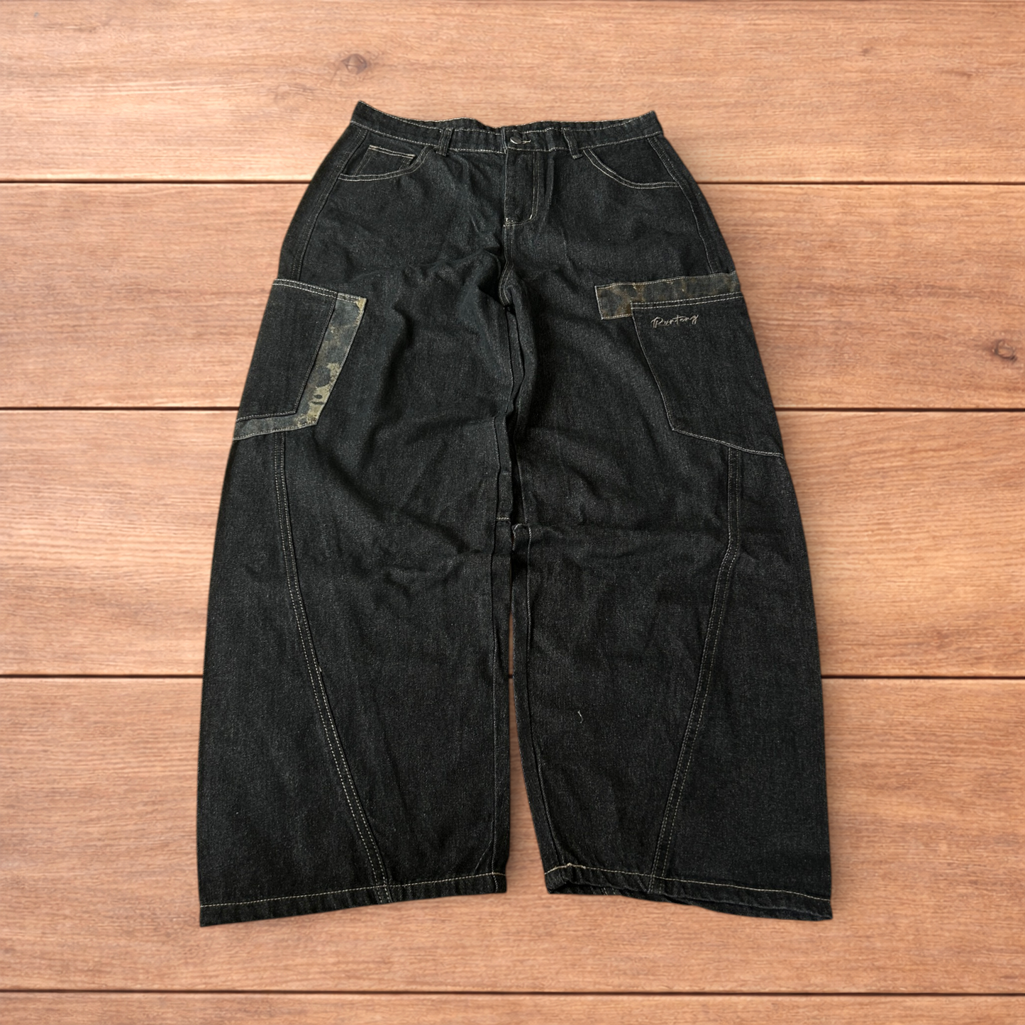 Incredible vintage style baggy wide leg skater fit jeans with leopard print in dark blue.