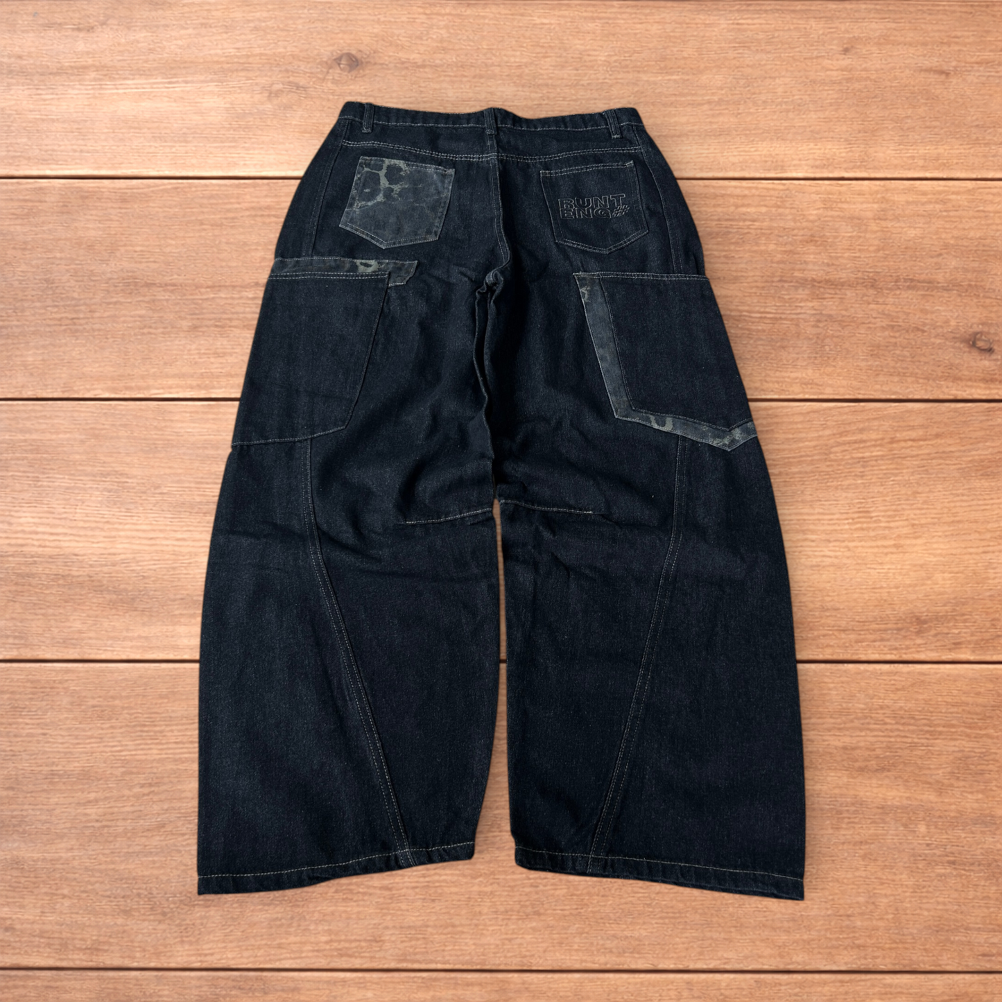 Incredible vintage style baggy wide leg skater fit jeans with leopard print in dark blue.