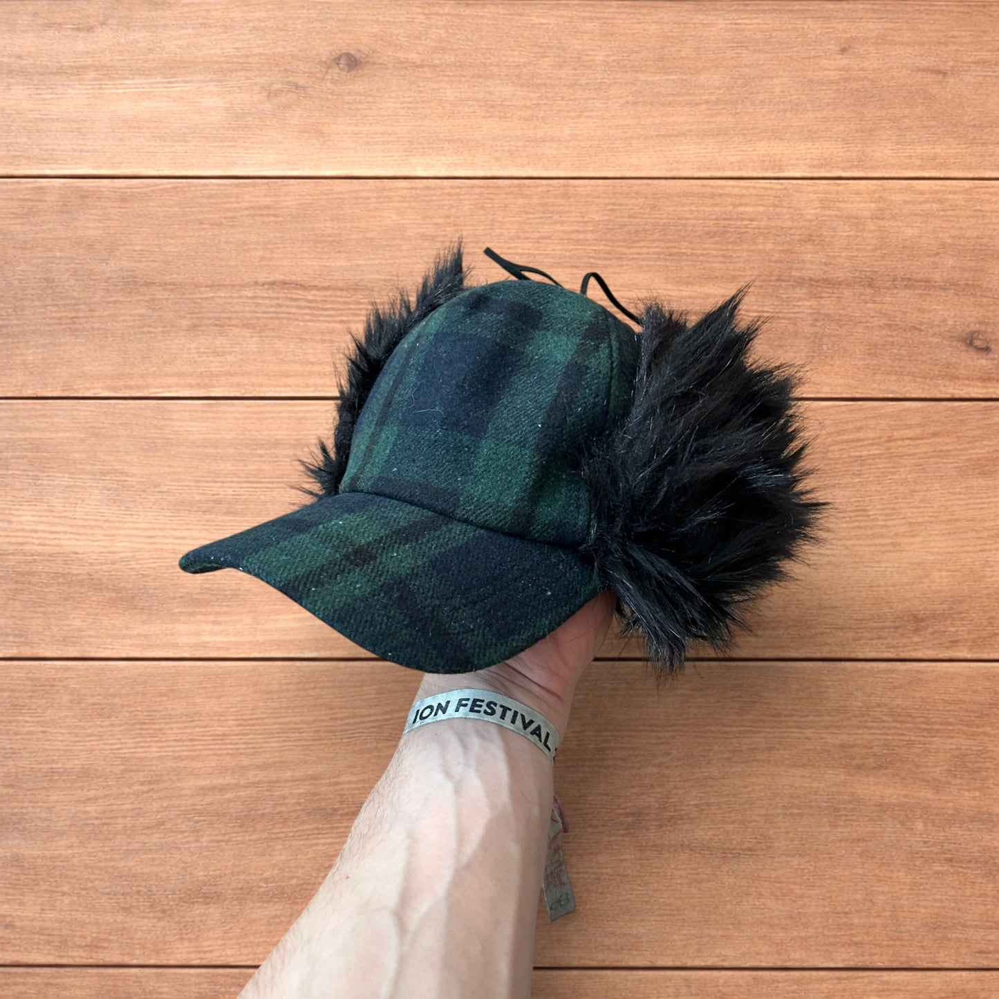 Vintage style trapper Russian ear flap hat cap in checkered khaki/black colour way.