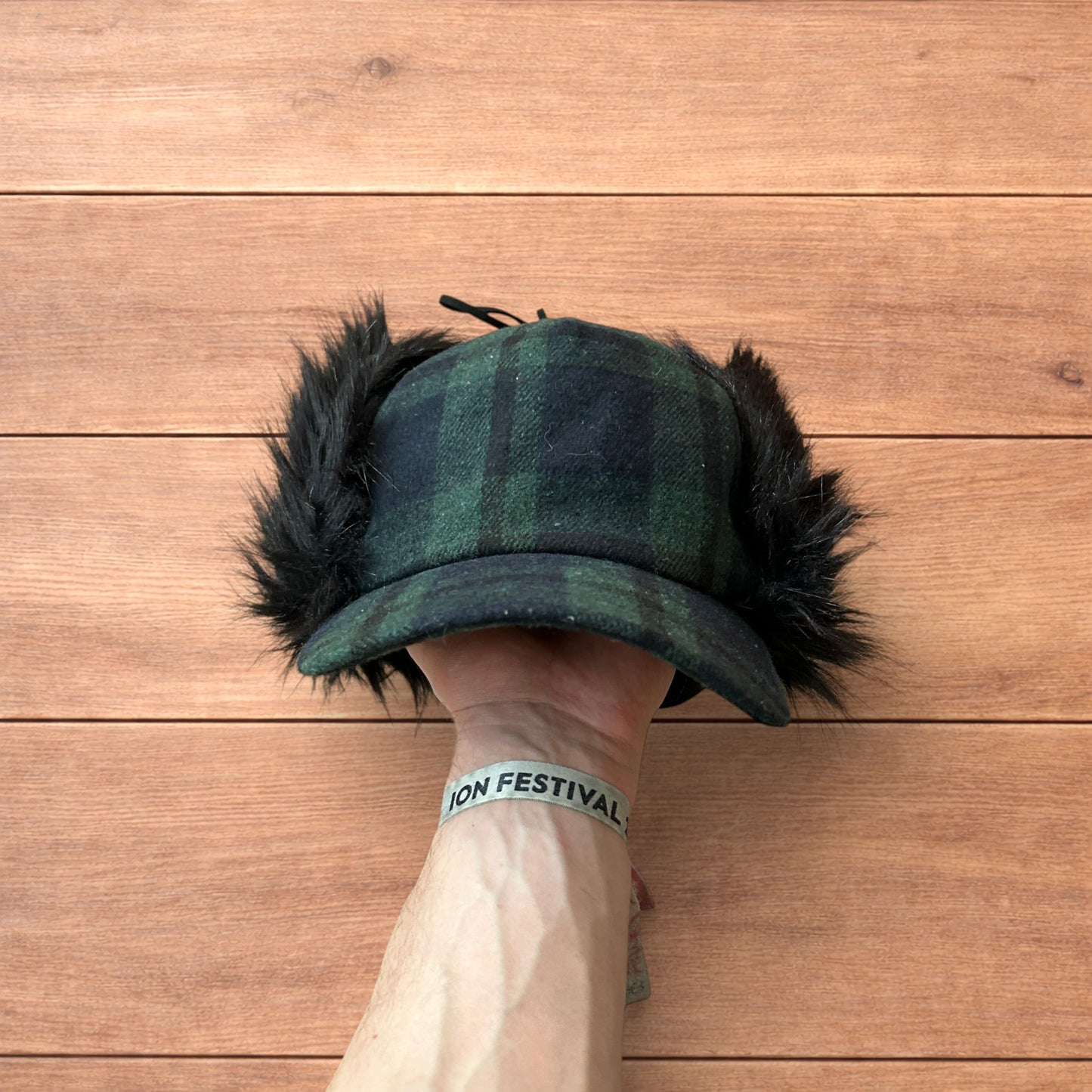 Vintage style trapper Russian ear flap hat cap in checkered khaki/black colour way.