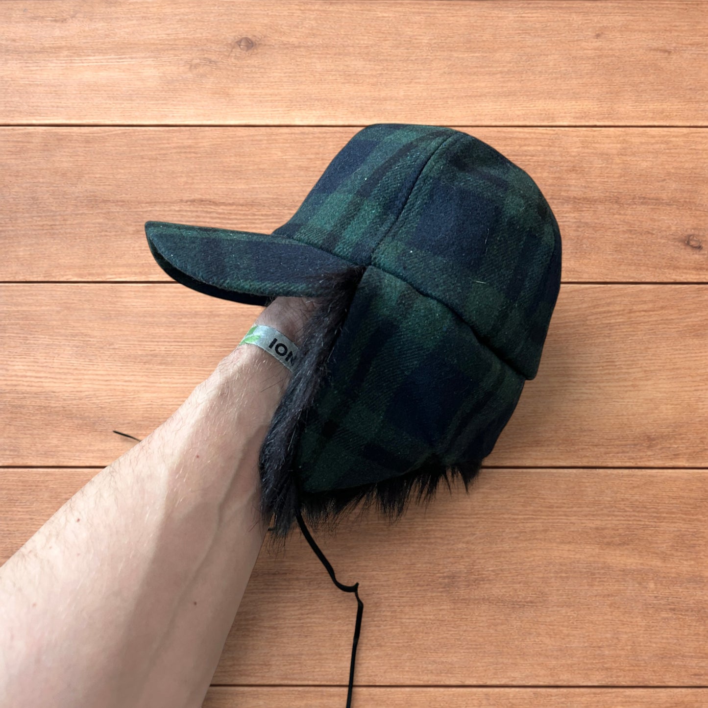 Vintage style trapper Russian ear flap hat cap in checkered khaki/black colour way.