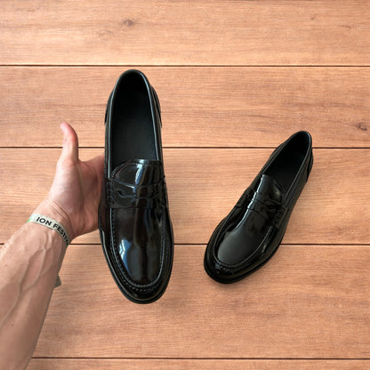 Lovely faux leather penny dress loafers shoes in black.