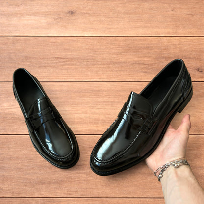 Lovely faux leather penny dress loafers shoes in black.