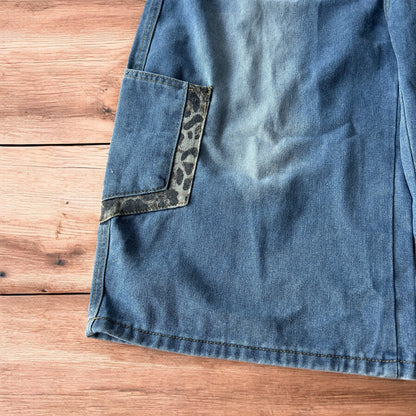 Vintage style baggy wide leg skater fit jorts shorts with leopard print in mid blue.