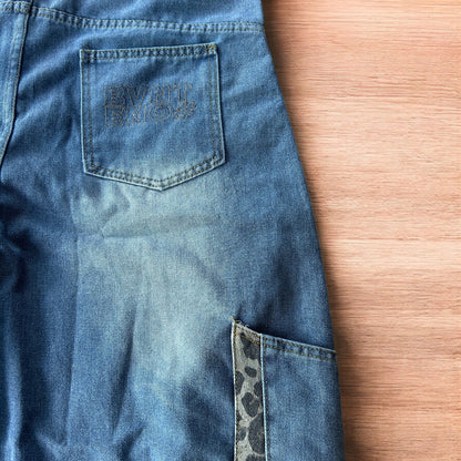 Vintage style baggy wide leg skater fit jorts shorts with leopard print in mid blue.