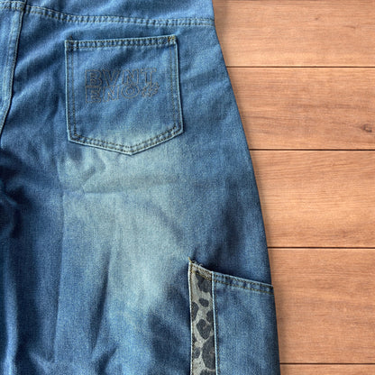 Vintage style baggy wide leg skater fit jorts shorts with leopard print in mid blue.