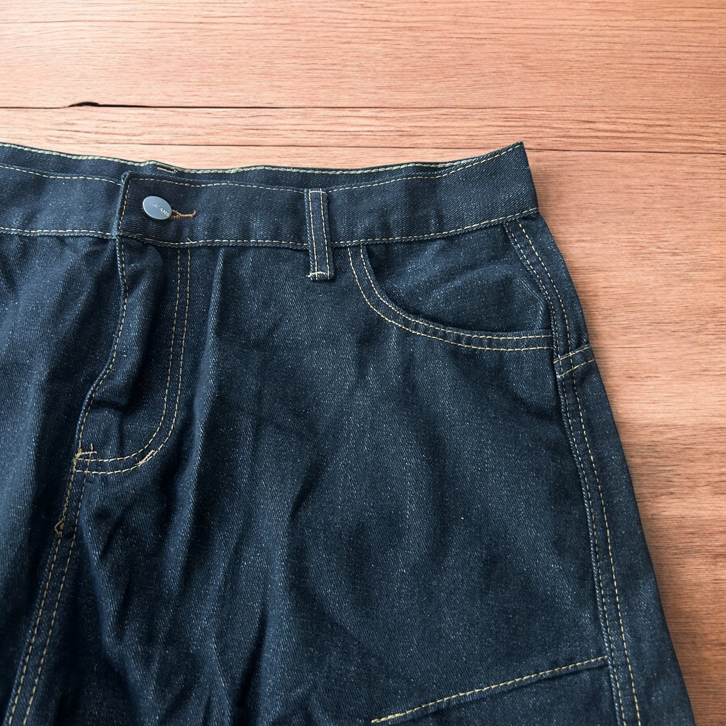 Vintage style baggy wide skater jorts shorts with leopard print in black.