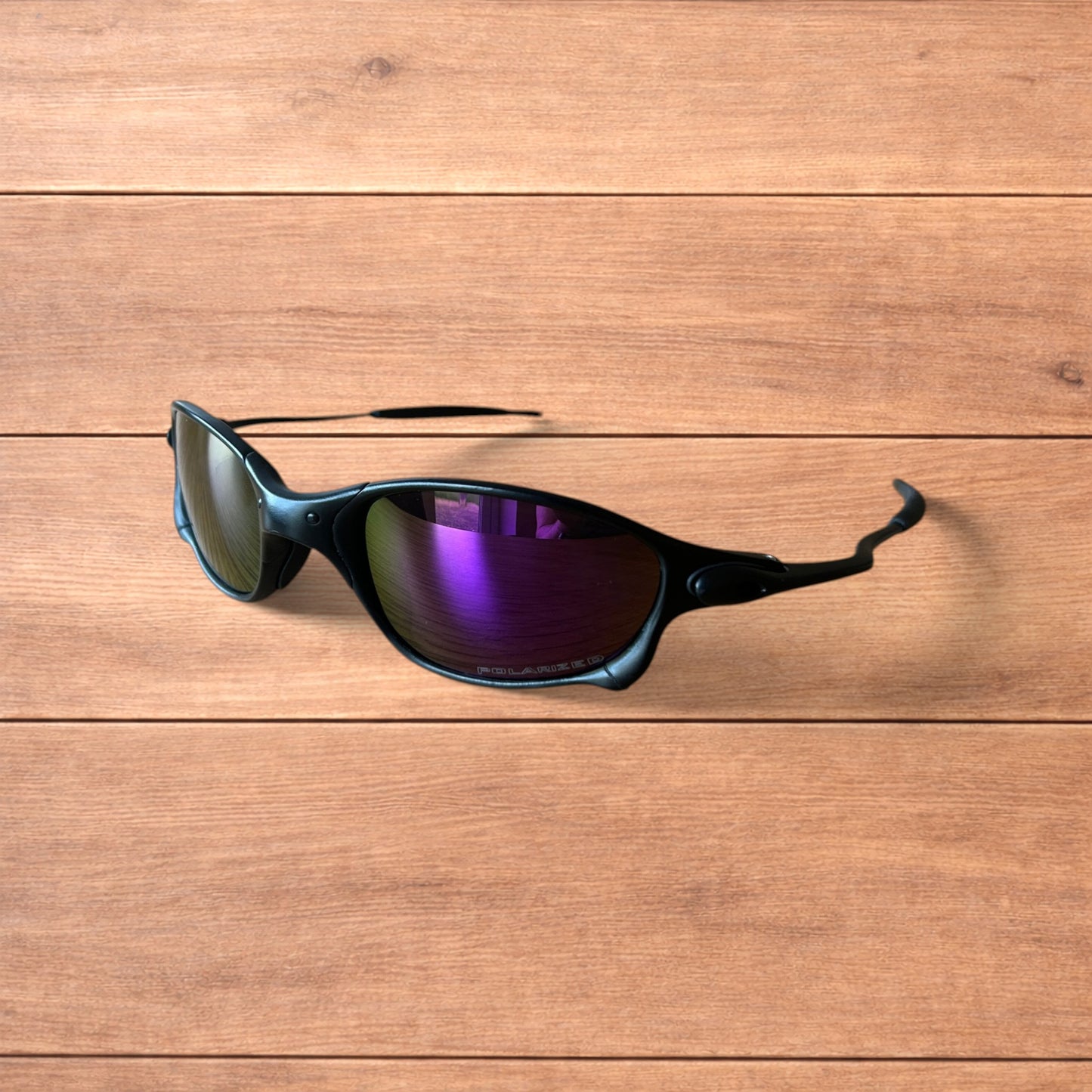 Insane metal frame polarised sunglasses in black frame purple lense.