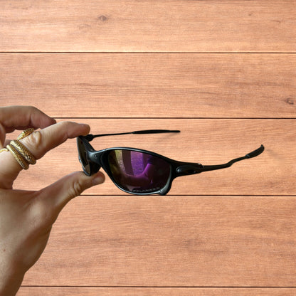 Insane metal frame polarised sunglasses in black frame purple lense.