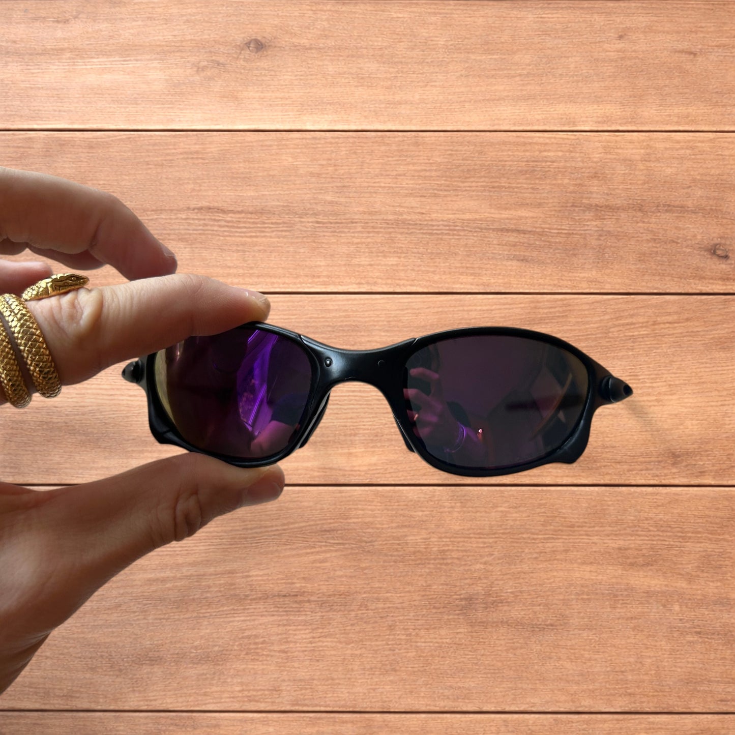 Insane metal frame polarised sunglasses in black frame purple lense.
