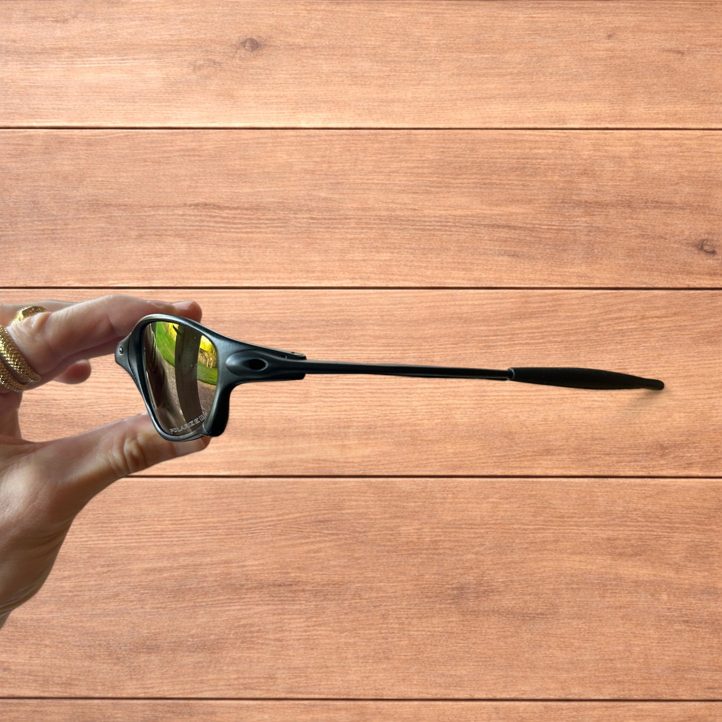 Insane metal frame polarised sunglasses in black frame purple lense.