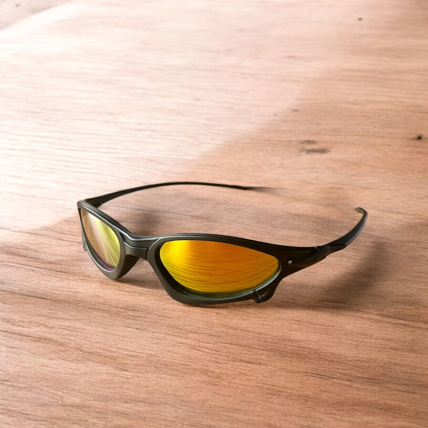 Insane polarised sunglasses in black with orange reflective lense. One size.