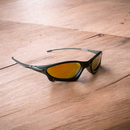 Insane polarised sunglasses in black with orange reflective lense. One size.