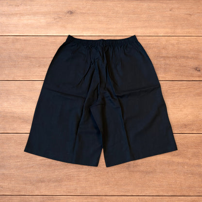 Super baggy wide leg linen shorts jorts in black.