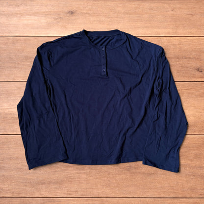 Relaxed fit henley long sleeve top in navy blue.
