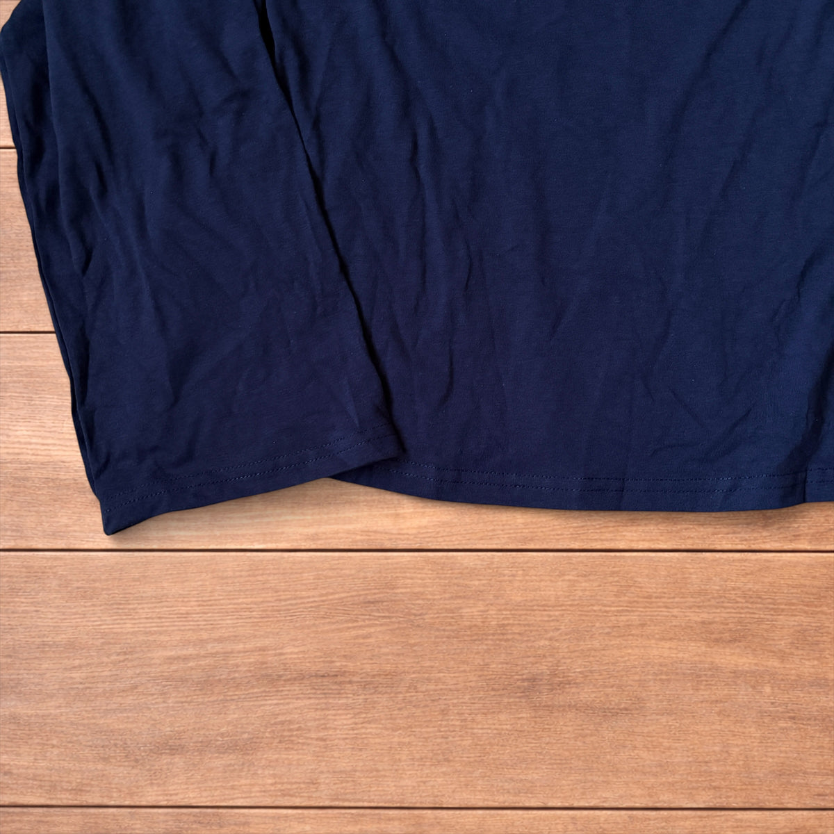 Relaxed fit henley long sleeve top in navy blue.
