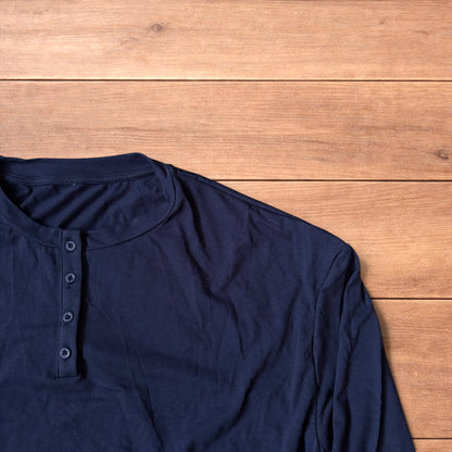 Relaxed fit henley long sleeve top in navy blue.
