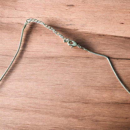 Lovely stainless steel necklace of cowboy cowgirl western boot in gold.
