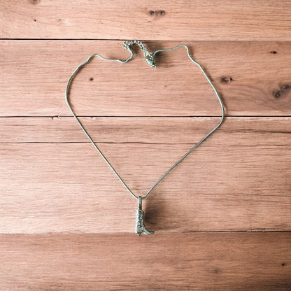 Lovely stainless steel necklace of cowboy cowgirl western boot in gold.