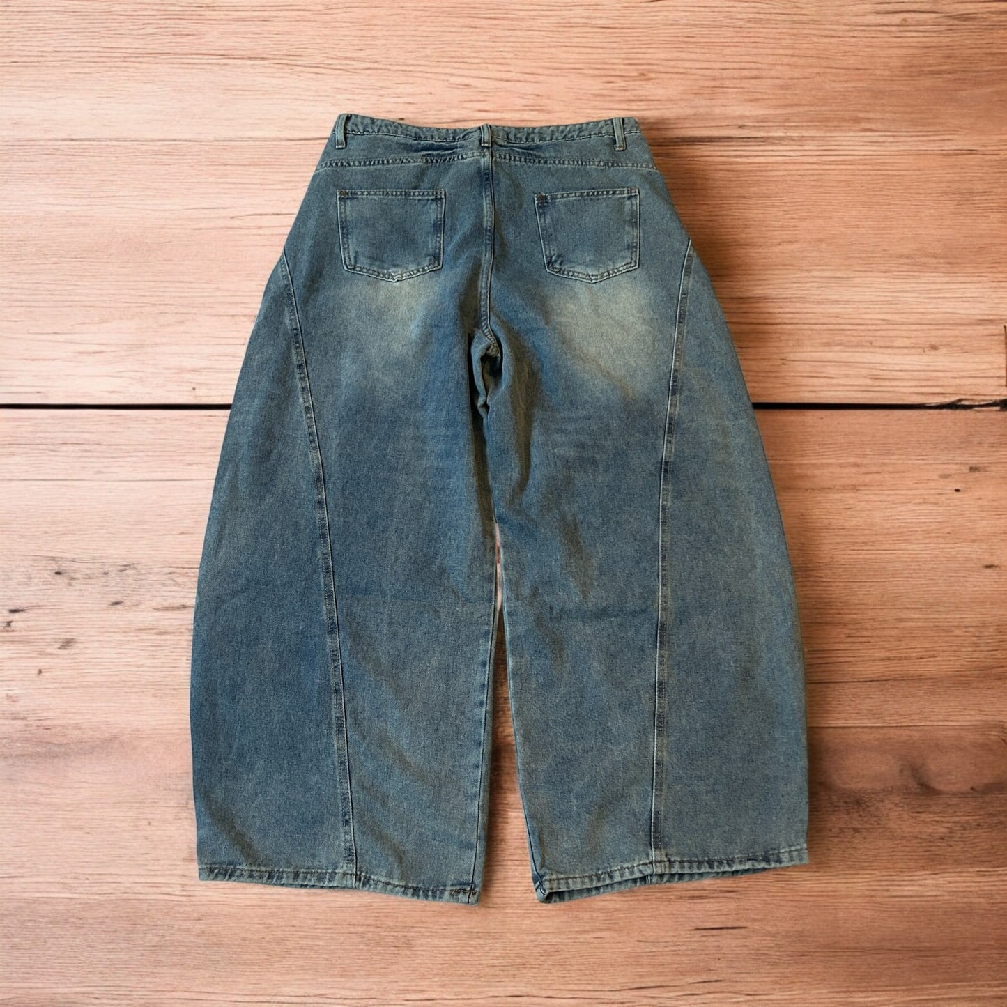 Incredible vintage style baggy wide leg skater fit jeans with fade in light blue.