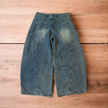 Incredible vintage style baggy wide leg skater fit jeans with fade in light blue.