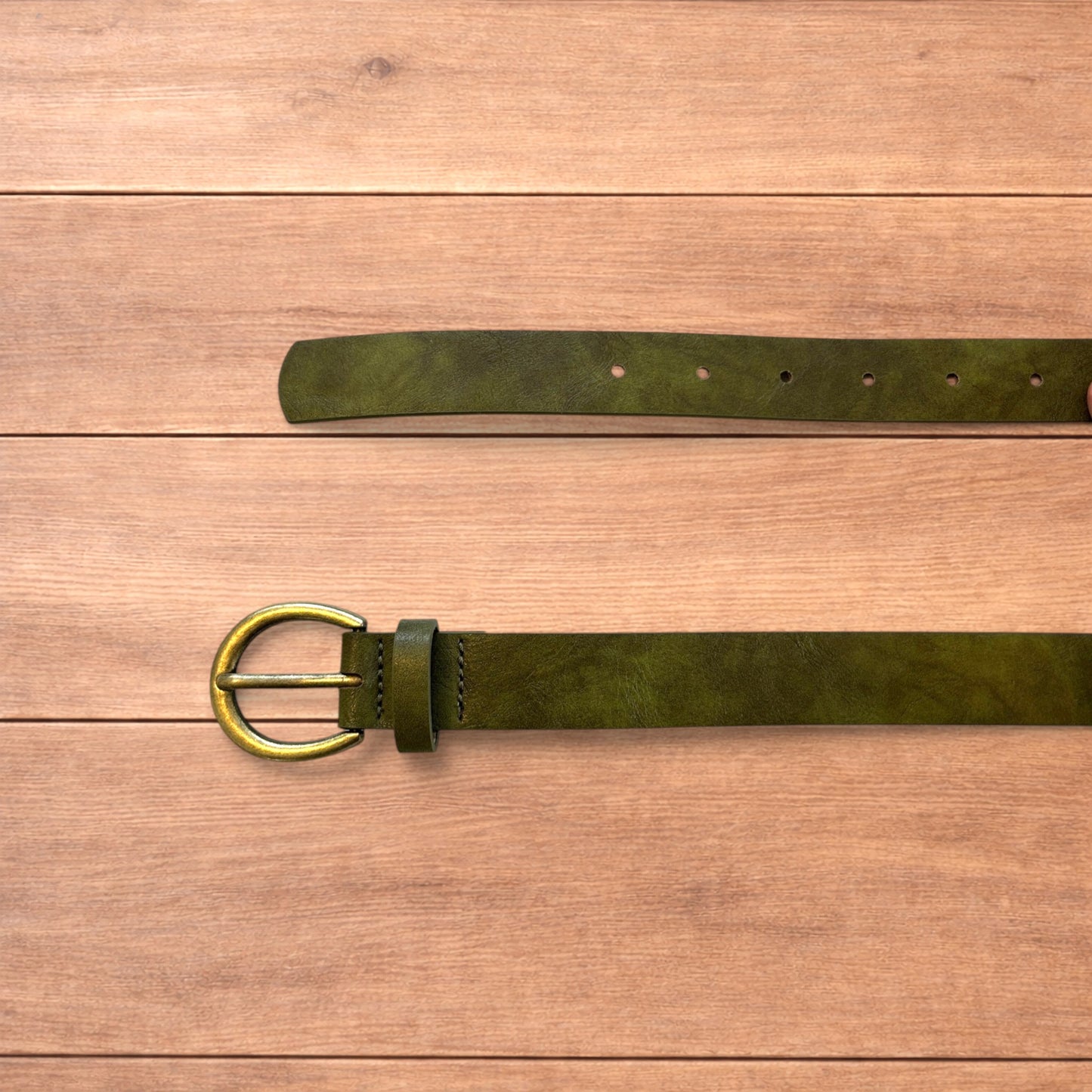 Vintage style faux leather boho cowboy belt in olive green with gold trim.