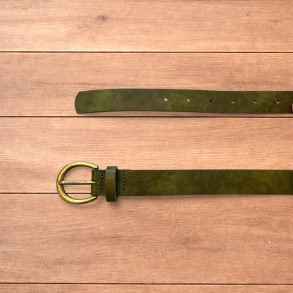 Vintage style faux leather boho cowboy belt in olive green with gold trim.