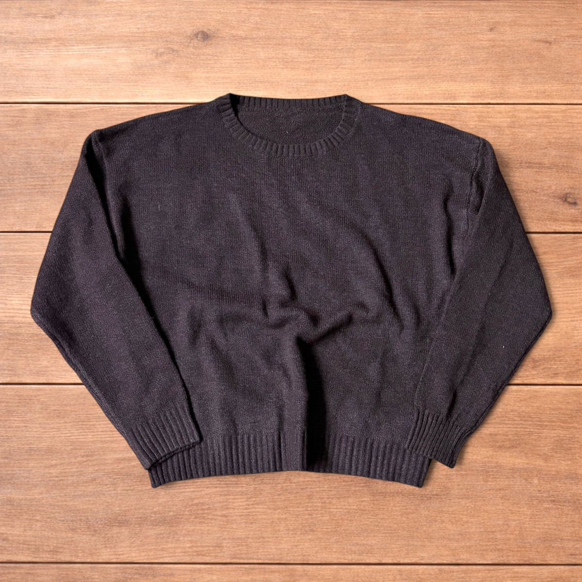 Vintage style knitted sweater jumper in brown.