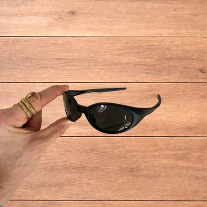 Insane mirrored polarised sunglasses in black with black lense.