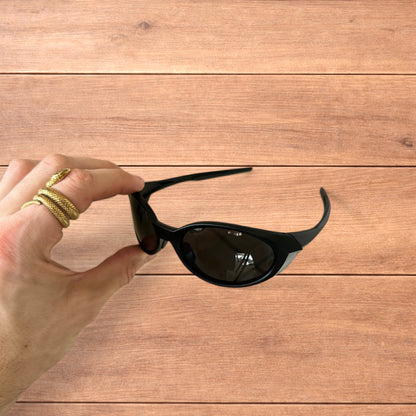 Insane mirrored polarised sunglasses in black with black lense.