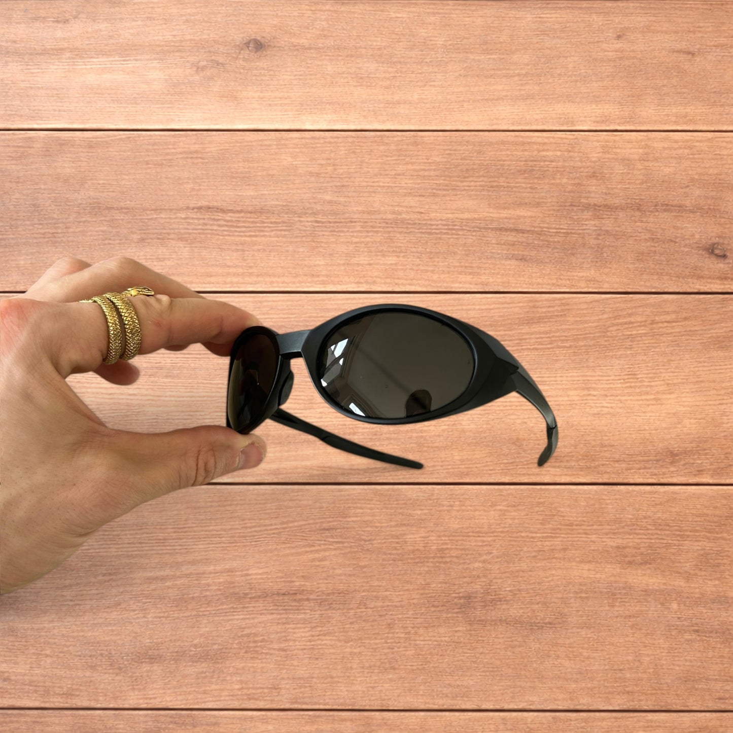 Insane mirrored polarised sunglasses in black with black lense.