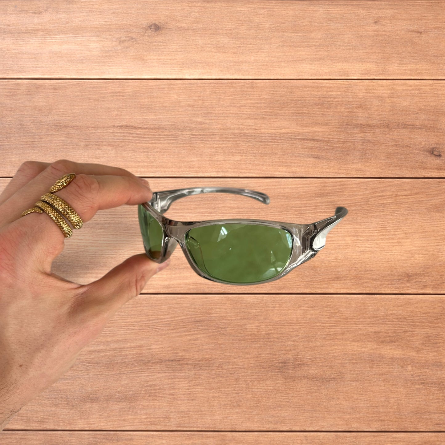 Cool reflective wrap around sunglasses in silver with green lense.