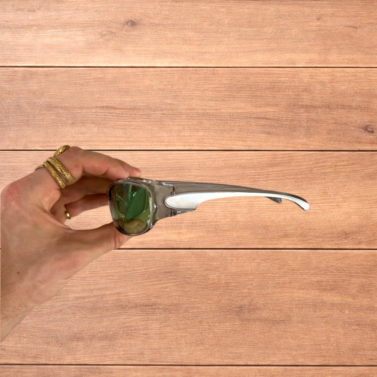 Cool reflective wrap around sunglasses in silver with green lense.