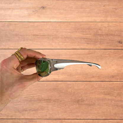 Cool reflective wrap around sunglasses in silver with green lense.