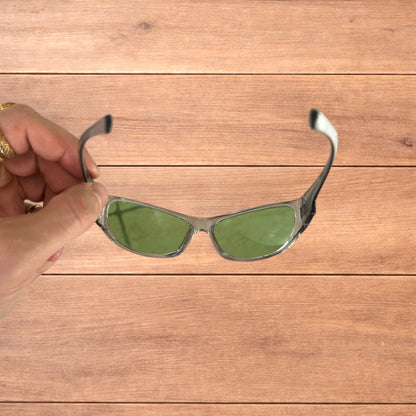 Cool reflective wrap around sunglasses in silver with green lense.