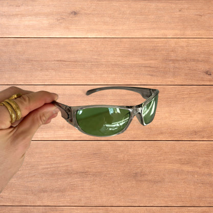 Cool reflective wrap around sunglasses in silver with green lense.