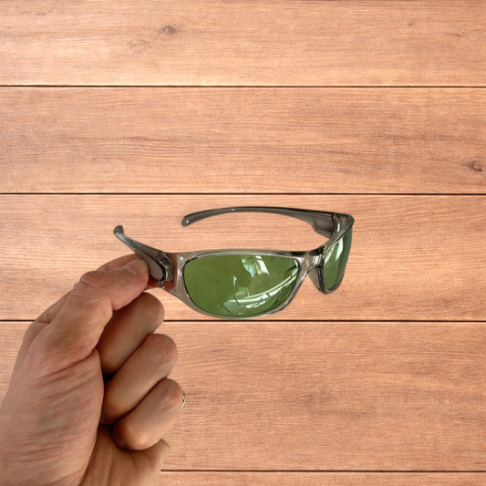 Cool reflective wrap around sunglasses in silver with green lense.