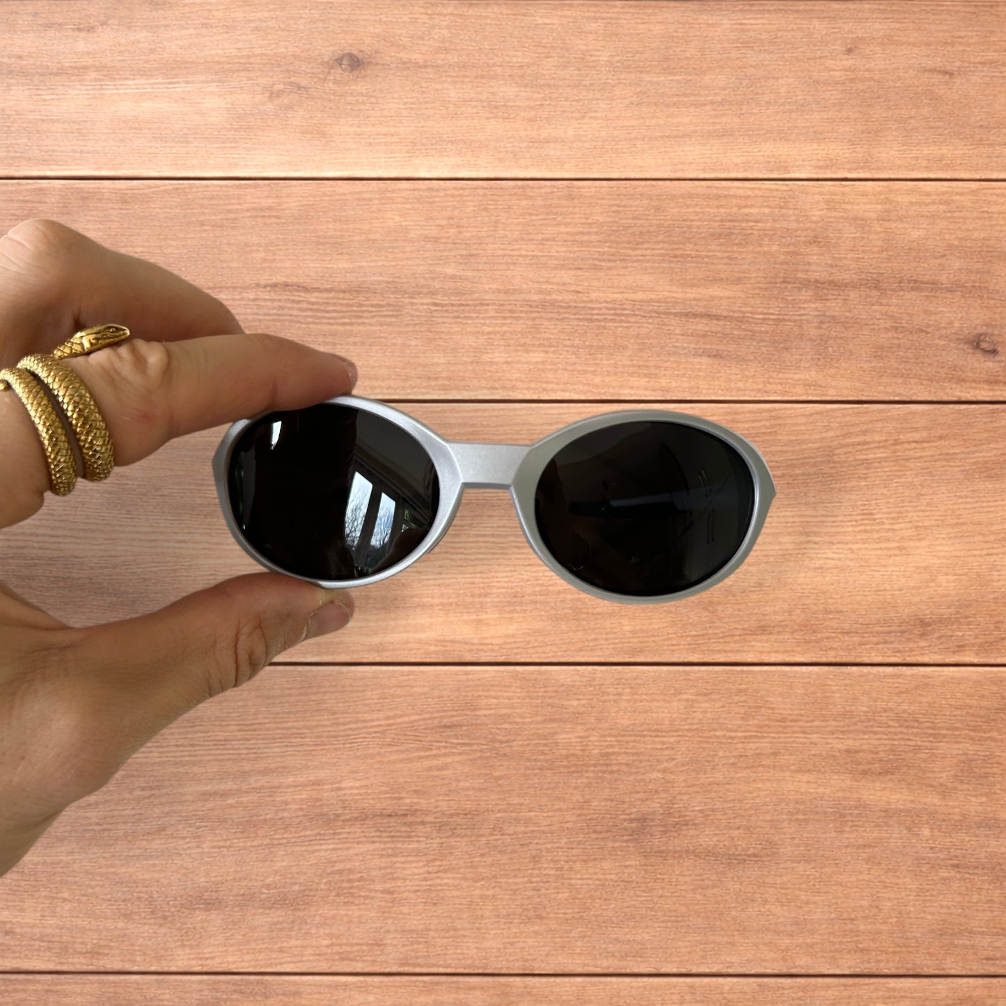 Insane mirrored polarised sunglasses in silver with black lense.