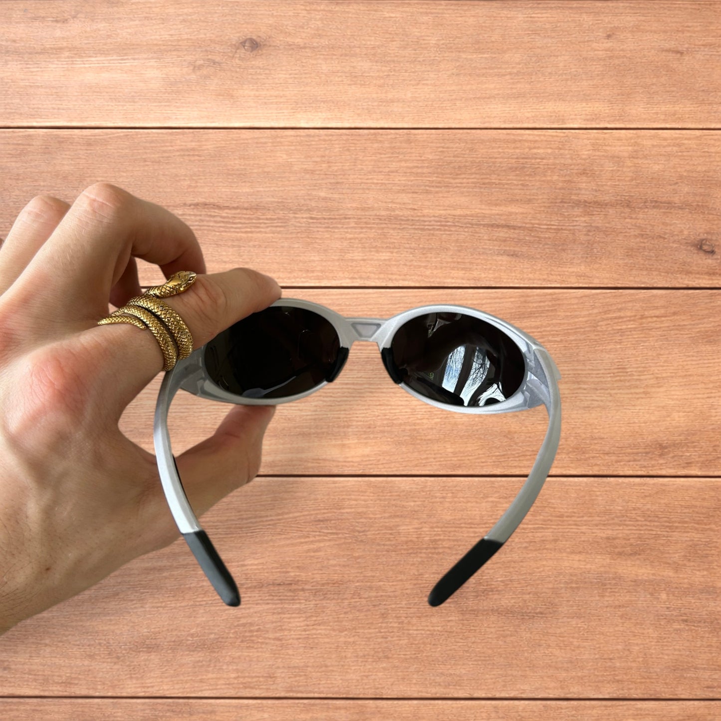 Insane mirrored polarised sunglasses in silver with black lense.