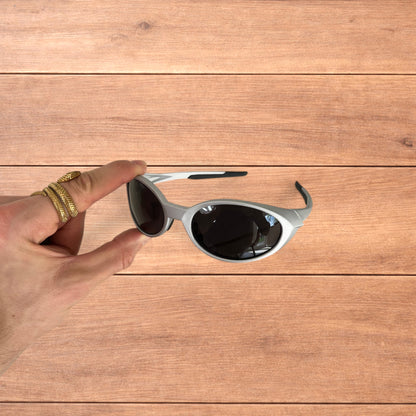 Insane mirrored polarised sunglasses in silver with black lense.