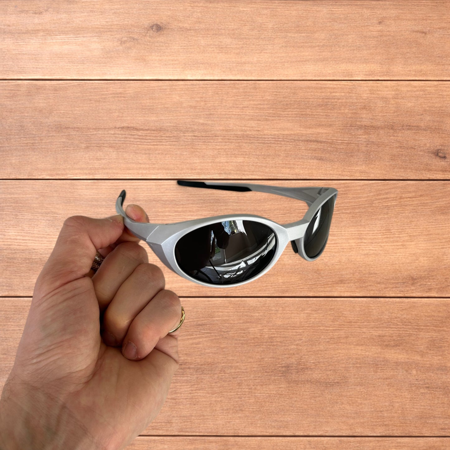 Insane mirrored polarised sunglasses in silver with black lense.