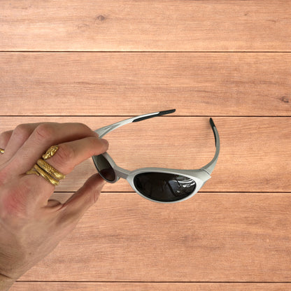 Insane mirrored polarised sunglasses in silver with black lense.